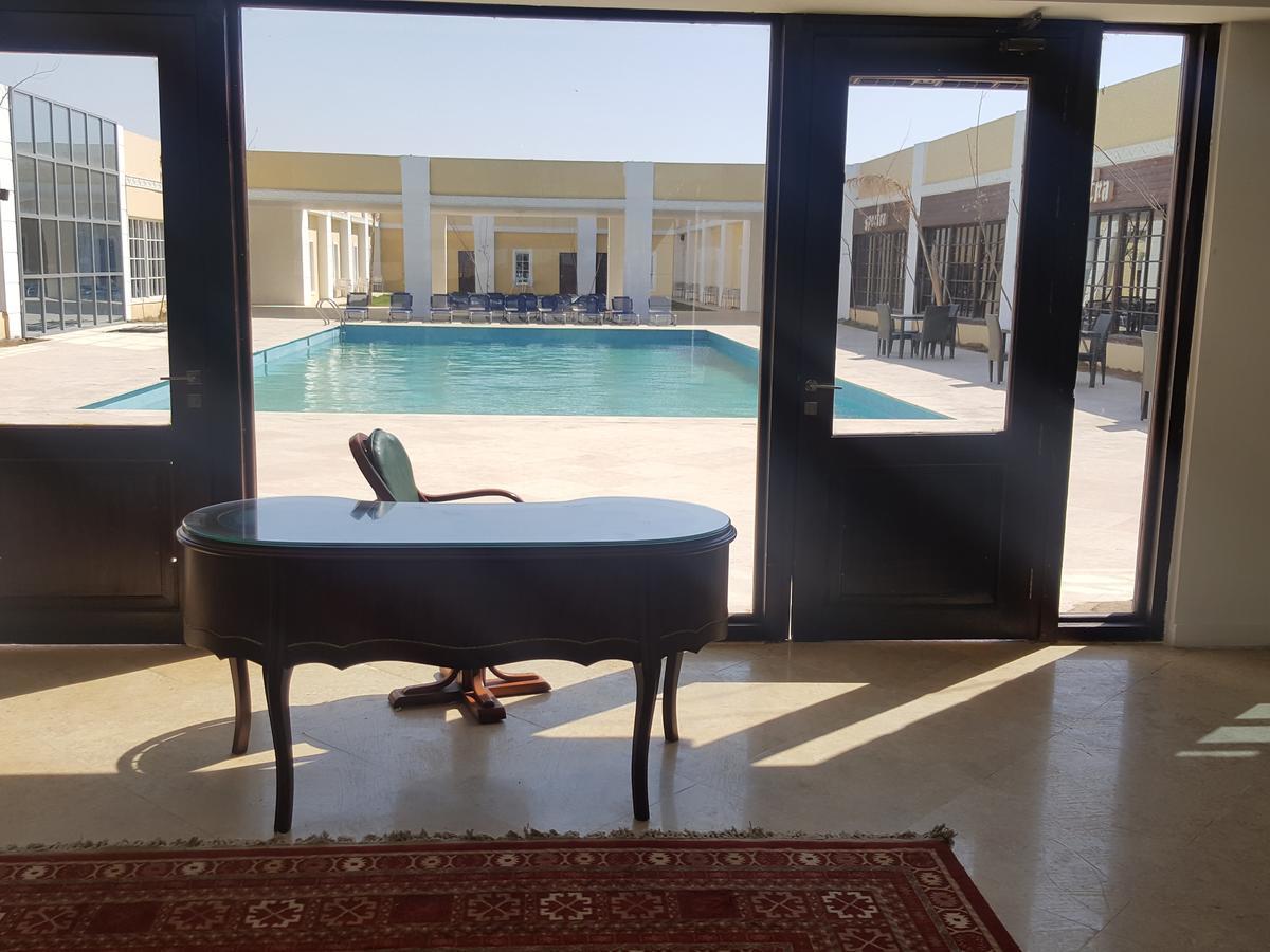 Spectra Inn Hotel 'Ezbet Sharikat Wardan Buitenkant foto